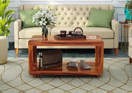 The glass tabletop is useful to serve coffee and snacks while the open wooden shelf is. Coffee Center Table Buy Wooden Center Tables Online Latest Center Table Designs