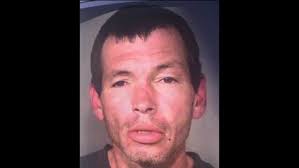 Man was strangled, stuffed in freezer, autopsy finds