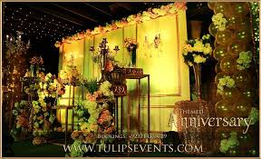 Get an anniversary party theme that represents your couple's unique relationship. Wedding Anniversary Party Tulips Event Management Wedding Anniversary Party Wedding Anniversary Party Themes Anniversary Party Decorations