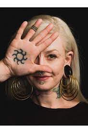 Scarification is a body modification that is slowly gaining more popularity, but it is not nearly as popular as tattoos. 15 Striking Portraits Show Extreme Body Modification Like You Haven T Seen It Before Body Modifications Body Suit Tattoo Body Art Tattoos