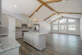 Grey kitchen cabinet photos in barndominium interior. Barndominiums Construction Contractor Built By Turnkey