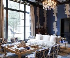 In this living room, blue is combined with black and a little light brown accent at the footstall. Blue Living Room With Black Accents Contemporary Living Room