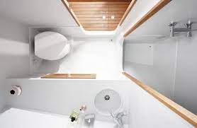 The second bedroom has a king size bed. Firmship By Studio Job Luxury Living In A 42 Foot Boat Tiny Bathrooms Boat Bathroom Small Bathroom
