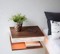 The large, rounded drawer pulls and bronze legs give this tall nightstand a distinctive, vintage look. 26 Space Saving Diy Floating Nightstand Ideas For Your Bedroom Inspira Spaces Floating Nightstand Modern Nightstand Diy Space Saving