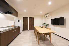 Inspiration for a timeless kitchen remodel in seattle with white appliances, open cabinets, white cabinets, white backsplash and subway tile backsplash for over the mixer. Guest House Koiyama Cho Serviced Apartment Kyoto Deals Photos Reviews
