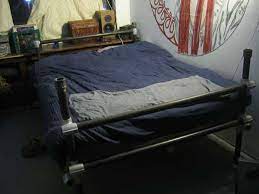 A soft industrial pipe bed frame: Modern Pipe Bed Frame Diy Design Idea Adding Industrial Flavor To Bedroom Decor