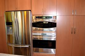 Full Height Kitchen Cabinets With A Stainless Steel Fridge And Microwave Wall Oven Combo C Balducci Addition Kitchen And Bath Remodeling Remodel Custom Kitchens