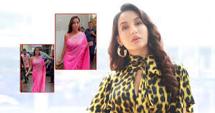 Nora fatehi (born 6 february 1992) is a canadian dancer, model, actress, singer, and producer who is known for her work in the indian film industry. Nora Fatehi Brutally Trolled Over Her Model Walk In Saree Dance Karte Karte Jana Tha Kya
