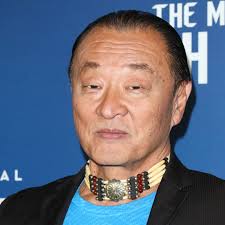 Sharon Stone and Paris Hilton in scarlet at LA benefit