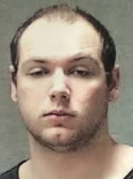 Police: Man fired shotgun at car occupied by wife, boyfriend