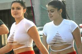 Nearly-Naked Ariel Winter Flashes Nipples & Belly With Boyfriend