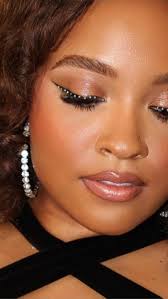 From L.A. to LA ⚜️ Thank you @essencefest Alwaysss a good, humid time ✨ •  Custom dress by @graffitiface Makeup by @kimberlynwilson_mua