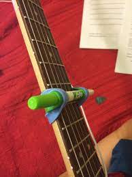 Diy Guitar Capo One Marker And Two Rubber Wrist Bands In Case I M Without A Capo Guitar Guitar Tips Electric Guitar Lessons