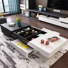 Exquisitely contemporary, the mcintosh coffee table is a treasury of geometric styling and smart hidden storage. Nerty Dual Color Centre Table With Multiple Storage Furwoodd
