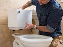 To make sure a proper seal is created with the flange and drain, temporarily add the seat and sit on the toilet. How To Replace A Toilet Diy Toilet Installation Guide Hgtv