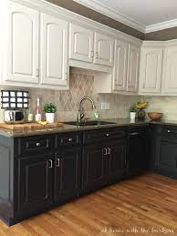 The black base below is simple and striking, while the white uppers and shelving keep the space looking bright and airy. Black Kitchen Cabinets The Ugly Truth At Home With The Barkers