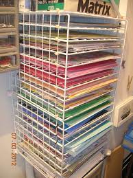 I Used The 12x12 Wire Cube Grids From A Garage Sale And Wire Tied Them Together To Make A Scrapbook Pape Craft Organization Scrapbook Paper Storage Craft Room