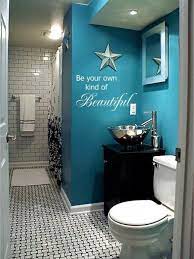 This colourful design employs small teal wall tiles, covering two walls from floor to ceiling. I Love Blue Of Any And Every Shade But The Aqua Teal And Turquoise Blues Of The Ocean Remain Very Teal Bathroom Decor Turquoise Bathroom Girl Bathroom Decor