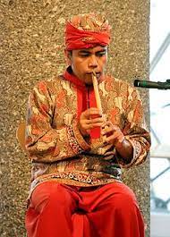 What is the process for checking in at the airport? Suling Wikipedia