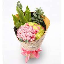 亲爱的阿姨 生日快乐 身体健康 永远美丽 开心 美国游子订购 花束晴日暖阳 送给上海市的亲友 送上最真挚的生日祝福 保证10年专业服务 支持全球 支付 海外游子礼品服务商