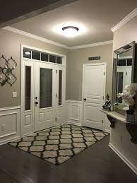 I'm very happy with these color choices. Entryway Wainscoting Anew Grey Sherwin Williams Paint Colors For Living Room Gray Living Room Paint Colors Grey Paint Living Room