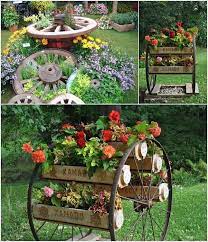 10 Amazing Ideas To Decorate Your Home With Wagon Wheels Outsidegardendecor Decorative Garden Fencing Diy Garden Decor Garden Projects