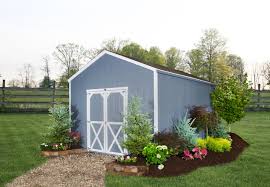Landscaping around your storage shed doesn't have to be anything elaborate. 24 Landscaping Around Outside Sheds Ideas Shed Landscaping Shed Plans Shed Storage