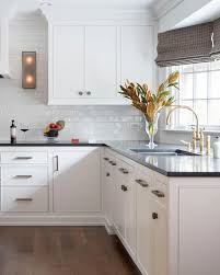 This stainless steel design from brother vs. Black And White Kitchen Design With Glossy White Glass Subway Tiles Transitional Kitchen