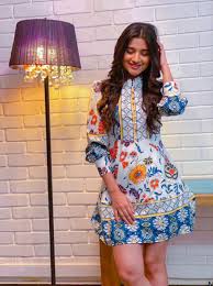 She pursued her master's degree and acting career simultaneously. Kanika Mann In Our Bria Vintage Floral Dress Made For Her Label