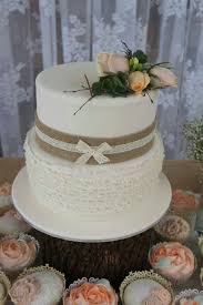 Two Tier Rustic Bridal Shower Cake With Ruffles Layers Burlap And Lace With A Spray O Rustic Wedding Shower Cake Bridal Shower Cakes Rustic Bridal Shower Cakes