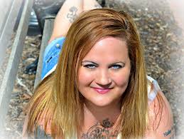 What is happening to the spider being dragged by the wasp in Hamilton, Ohio?