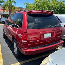 Image result for Bright Silver 2000 Caravan