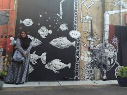 Creating a message through street art in kota bharu. Cek Mek Molek Street Art Coffeecupcloset