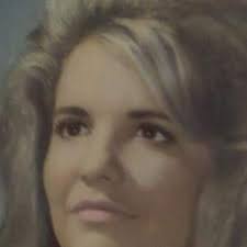 Who is the young man with dark hair who cut grass for free in Shelby