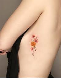Cherry blossom pink ribbon tattoo by deefrost design & tattoo. 45 Charming Side Boob Floral Tattoo Designs You Would Love To Try Cute Hostess For Modern Women