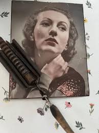 old antique hair curling irons. these are chipped from one shape, they made  a "wave" see the last photo. the handle is wooden.