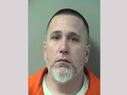 Woman says man tried to drag her off sleeper sofa