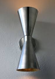Here are house exterior paint colors for all who prefer light. Nothing Better Than A Cool Wall Sconce Haha Modern Outdoor Lighting Mid Century Modern Exterior Modern Style Lights
