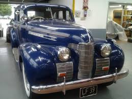 Image result for Trojan Maroon 1939 Oldsmobile