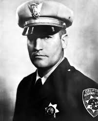 NYPD Patrolman teaching spanish to the Troops. Credit Criostoir Suilleabhain