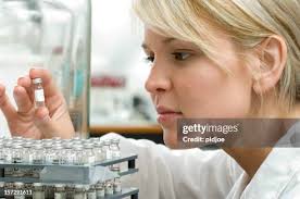 20,648 Person Looking At Test Tube Stock Photos, High-Res Pictures, and  Images