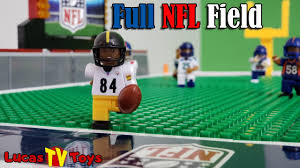 Ashton wants this one for his class but done in dallas cowboys. Nfl Football Field And Minifigures Buildable Set Lego Compatible Set Review Youtube