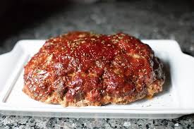 Add the tomato paste mushroom water to the meat and mushrooms. Ultimate Meatloaf With Tangy Sauce