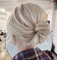 Each season sees them back your beachy waves will also look great when swept into a messy top knot, with a few escaping locks. 60 Trendiest Updos For Medium Length Hair Low Knot Updo For Blonde Hair Updos For Medium Length Hair Medium Length Hair Styles Hair Styles