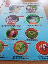 Cendol with palm sugar syrup and coconut milk is a type of dessert in malaysia. Cendol Durian Melaka Sedap
