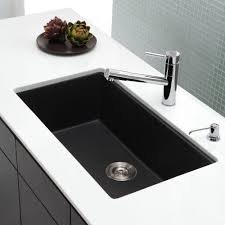 There are a number of reasons some people prefer porcelain sinks, including their sleek, classic appearance and. Kraus Undermount Granite Composite 32 In Single Basin Kitchen Sink Kit In Black Kgu 413b The Home Depot Granite Kitchen Sinks Single Basin Kitchen Sink Kitchen Sink Remodel