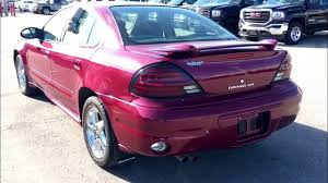 Image result for Red Brown 2004 Pontiac
