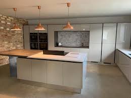 For subtle contrast, two different shades of the same calm colour tend to work better on cabinetry than three or four, which can look like a design mistake. Grey Glossy Light Grey Kitchen Tiles Design Novocom Top