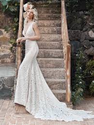 Many sheath designs hug the hips, showing off a bride's curves and highlighting her feminine charms. Long Train Wedding Dresses For An Extra Glamorous Occasion