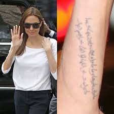 Angelina jolie's back tattoos found themselves in headlines worldwide when the inking was revealed at a 2017 movie premiere. Angelina Jolie S 16 Tattoos Meanings Steal Her Style